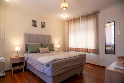 Double bed across from the mall + Fast Wi-Fi