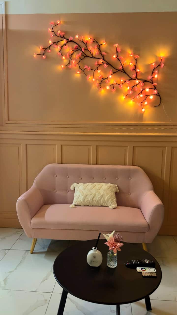 Salon de la Suite Rose avec canapé