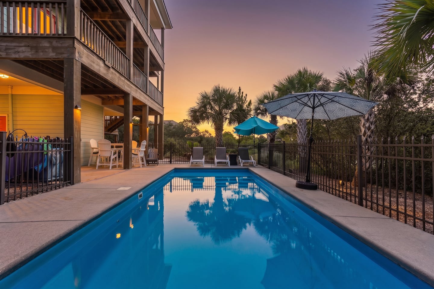 Slip into the pool as the sky goes orange over the dunes: the house lit up above you, the Gulf a few streets away. Your own private pool, no resort crowd to share it with.