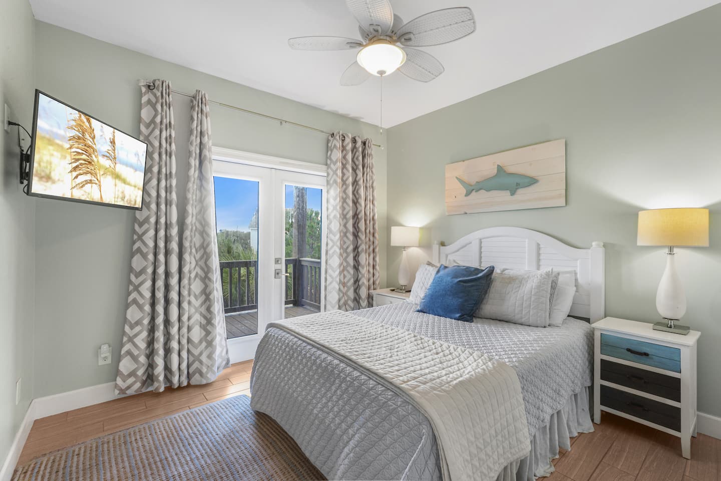 Throw open the French doors and step straight onto the deck from bed: your own TV, your own outside, no hallway required.