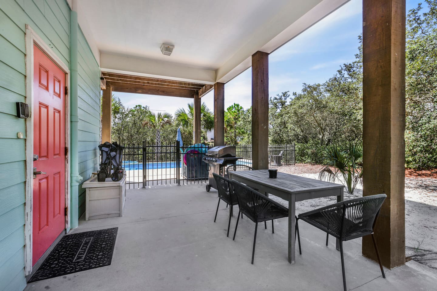 Fire up the gas grill while the kids finish their last cannonball: dinner at the outdoor table with the pool right there in front of you.