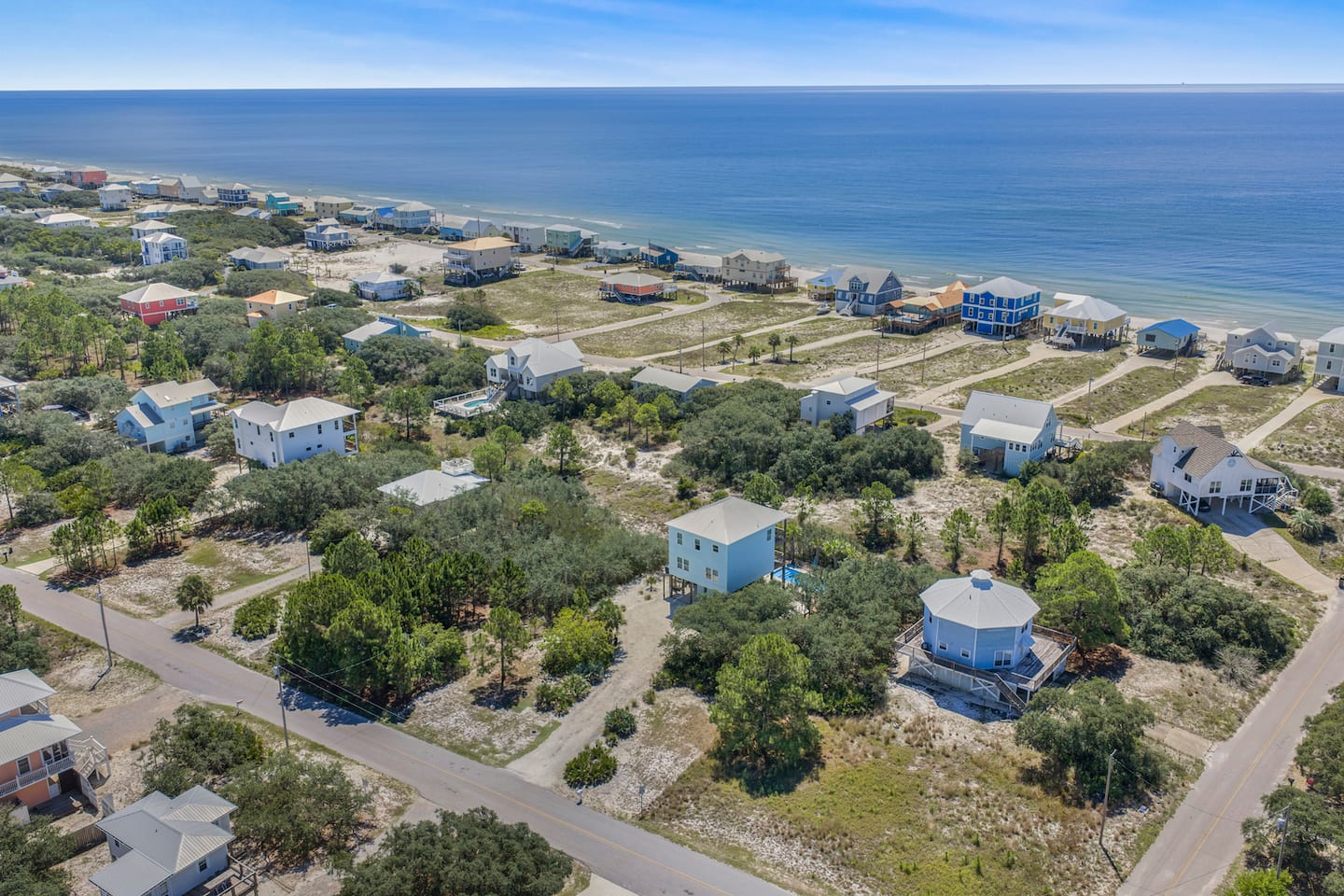 Bike the quiet streets between the dunes and the Gulf: no traffic, no crowds, just scrub oaks and beach houses all the way to the water.