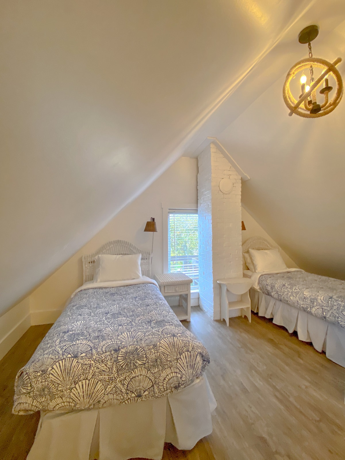Secondary bedroom features two single beds.
