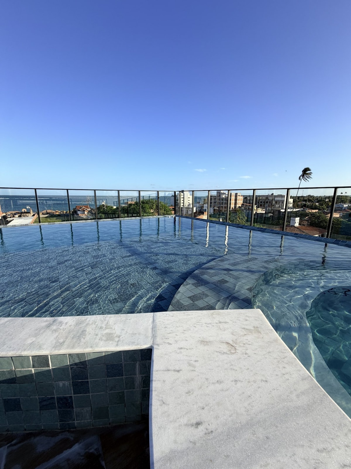 Apartment steps from the beach · Rooftop infinity pool - Apartments for ...