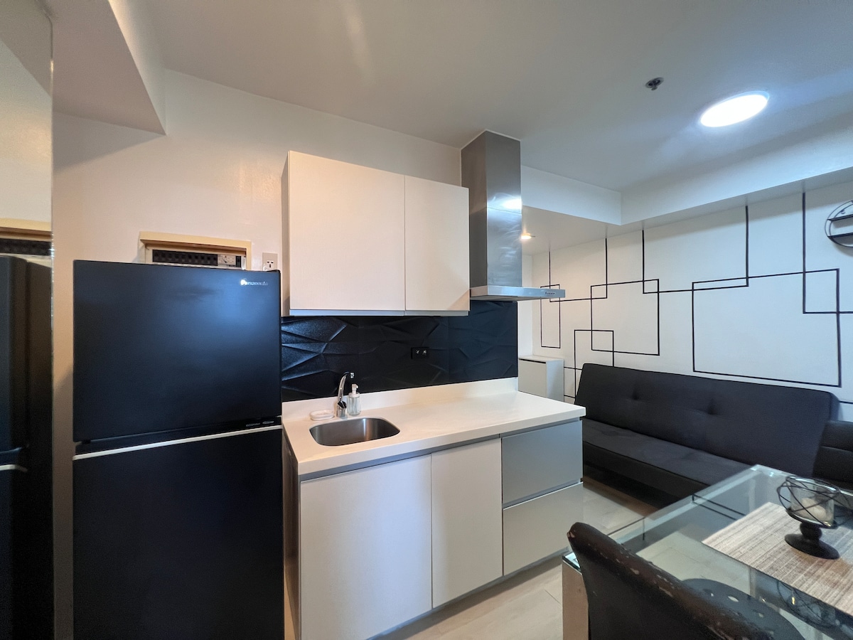 Modern & Chic 2BR Condo at Azure | High-Rise Views - Apartments for ...