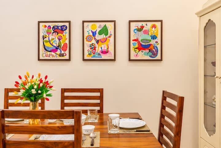 Its warm wooden finish adds a touch of natural charm, complementing the home’s modern and welcoming interiors.
