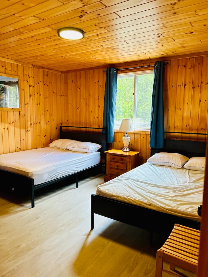 2 brand new double beds with USB ports in the bed frames. Bedroom has an ensuite bathroom with shower. 