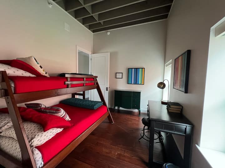 Our Bunk Room: only the funnest room ever! One double, one twin.

Large Closet: hangers, pack and play in closet, high chair for island, gate, adult & kid games and some toys / books for the kiddos. 

Room also includes a personal work space.