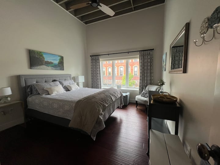 Large Queen Room:
Large closet: hangers, luggage seat, basket for laundry, also the clean up items you may need: spare vacuum, handheld vacuum / parts, and broom.

Great view of the Ore Dock Brewery expansion and of course Getz!