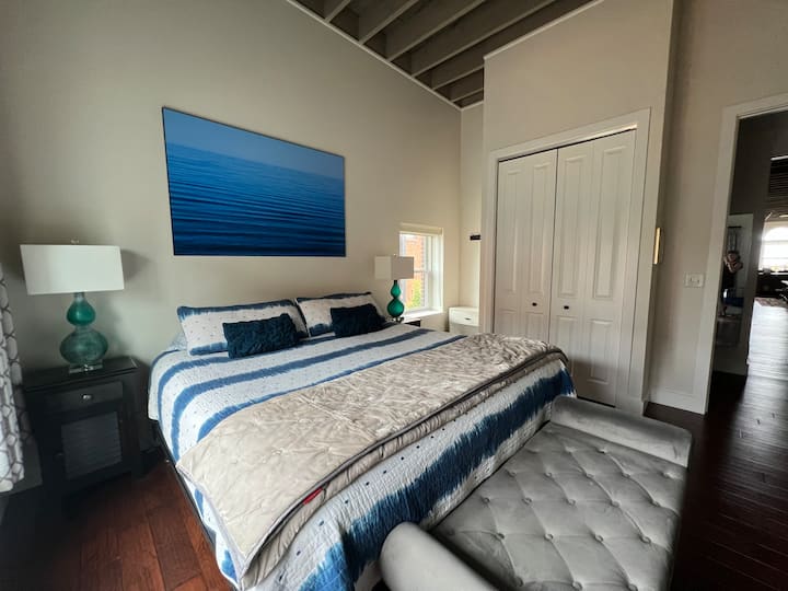 King Room:
Large closet, closet includes: hangers, iron, ironing board, luggage seat and basket for laundry.

Great view of the Ore Dock Brewery expansion and of course Getz!