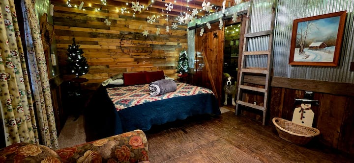 An extremely comfortable King Sized bed with an attached bathroom for the Master Suite.