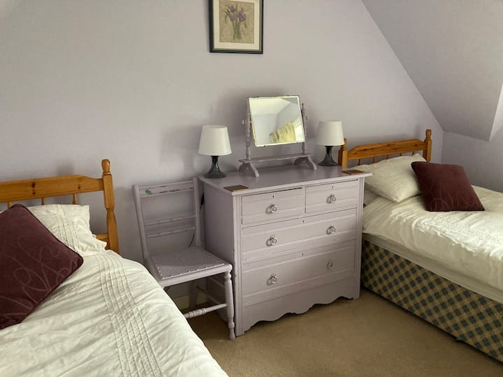 The East ( Lilac) bedroom, 2 single beds. Aug ‘24