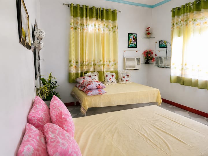 Queen Bed and Full size bed that can accommodate up to 4 people, located in the first floor where guests can experience a nice and comfortable sound asleep.  All beddings are cotton which are skin friendly.