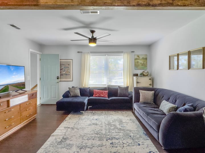 Relax in the comfortable, vintage-themed living room