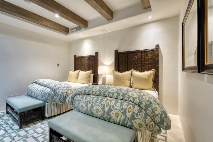 The guest room has two queen beds.