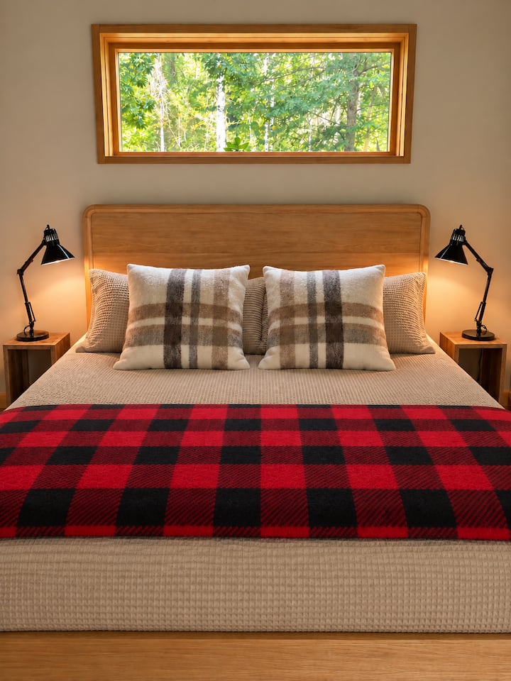 View stars at night from your cozy king bed.