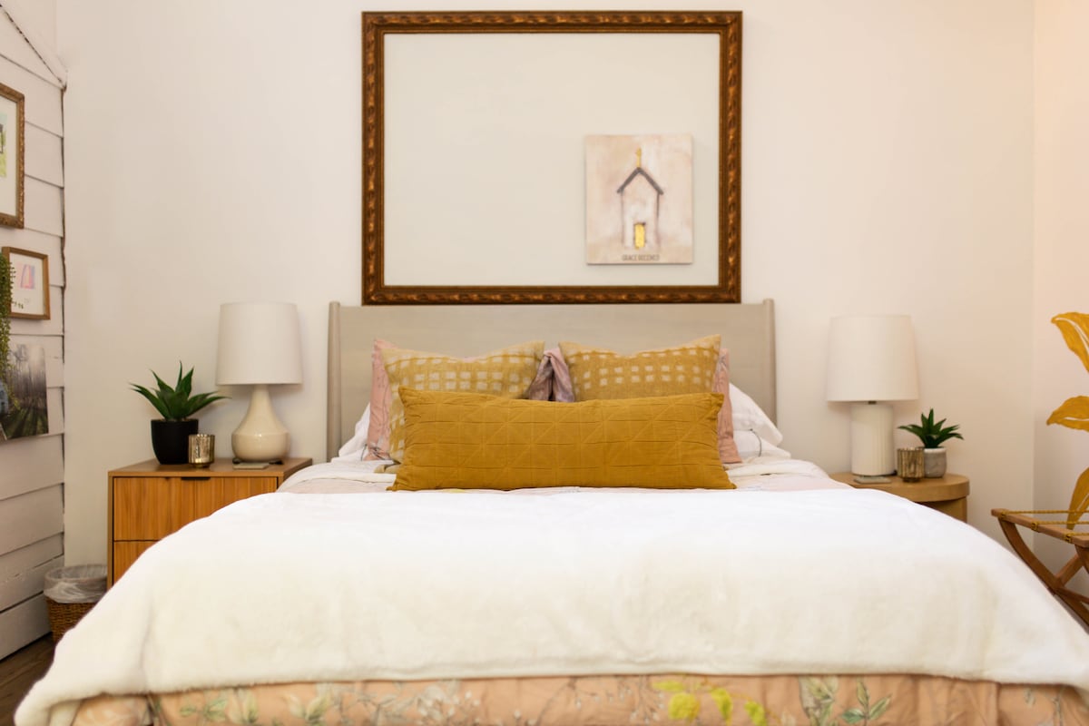 The bed is a queen size and features a Tuft & Needle mattress. Our bedding is 100% cotton with high quality, stylish duvets from West Elm.