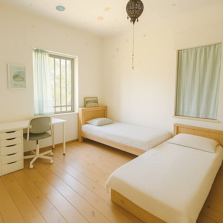 The youth bed opens up to another single bed that can be placed in different places in the room