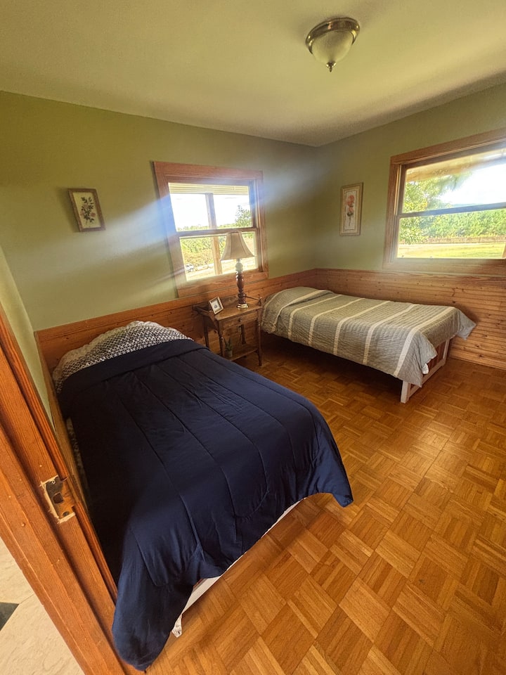 First floor Bedroom with two twin beds, full bathroom connected