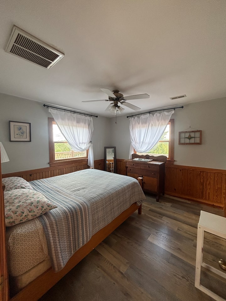 Upstairs bedroom with queen bed. 