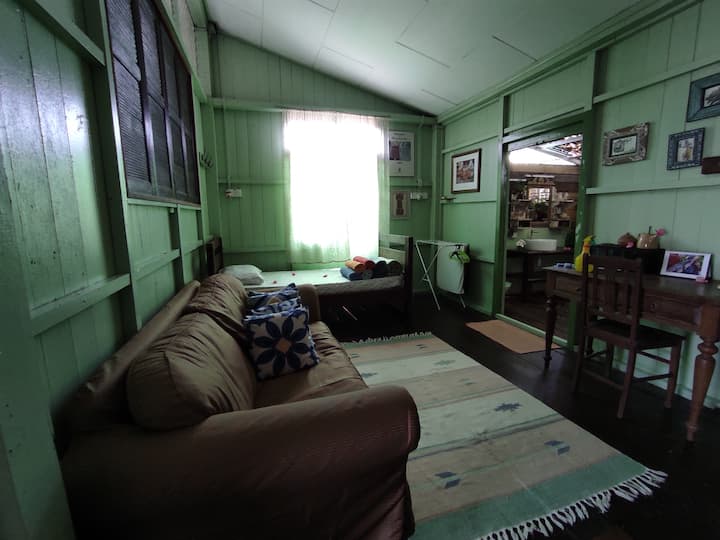 Main bedroom (Bedroom 1) with ensuite open-air bathroom