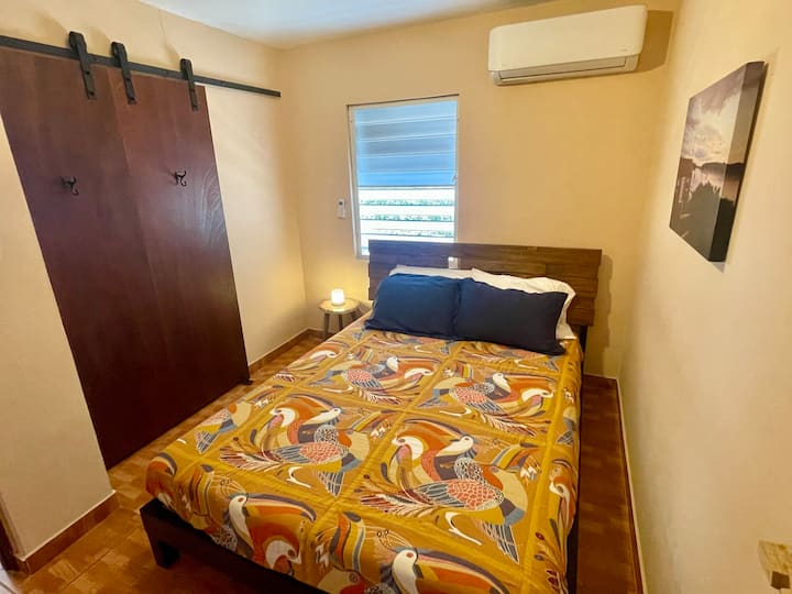 The 'Maine Cottage' Room (bedroom #3: queen bed)
Closet: Shelving Space
Behind door: Hanging Space & Hangers
Bedside lamp with multi-USB ports
1 mirror on wall
1 Window
AC with remote control