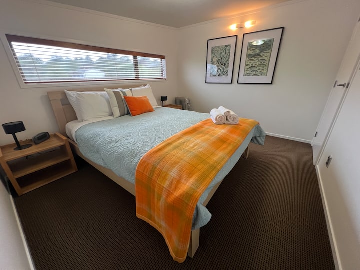 Bedroom 2 : sleeps 2 
Comfortable  Queen bed with quality linen made up ready for your arrival along with bedside tables, lamps and radio clock. 

Please note* Bedroom 3
is accessible via this room(small room suitable for children/Teens) 