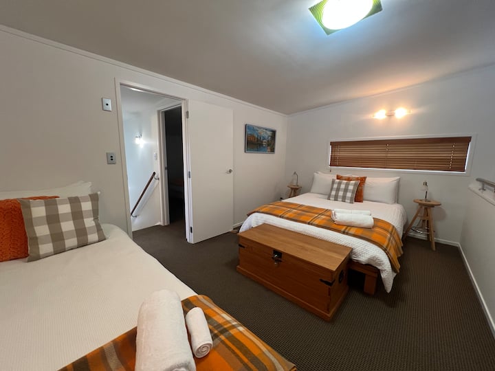 Mezzanine Bedroom shows 1 x queen bed and 1 x king single - shared room sleeps 3 