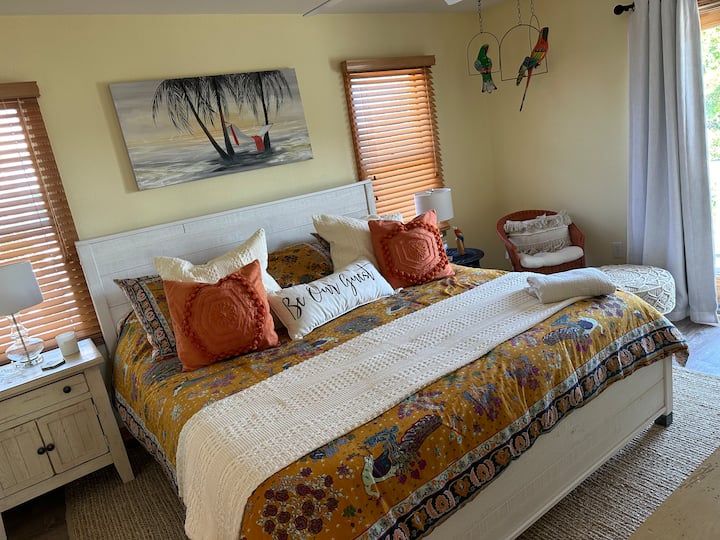 Upstairs master with access to the top deck and en-suite bathroom.