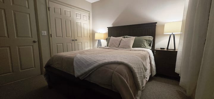 Our queen sized bedroom is beautifully decorated and cozy.