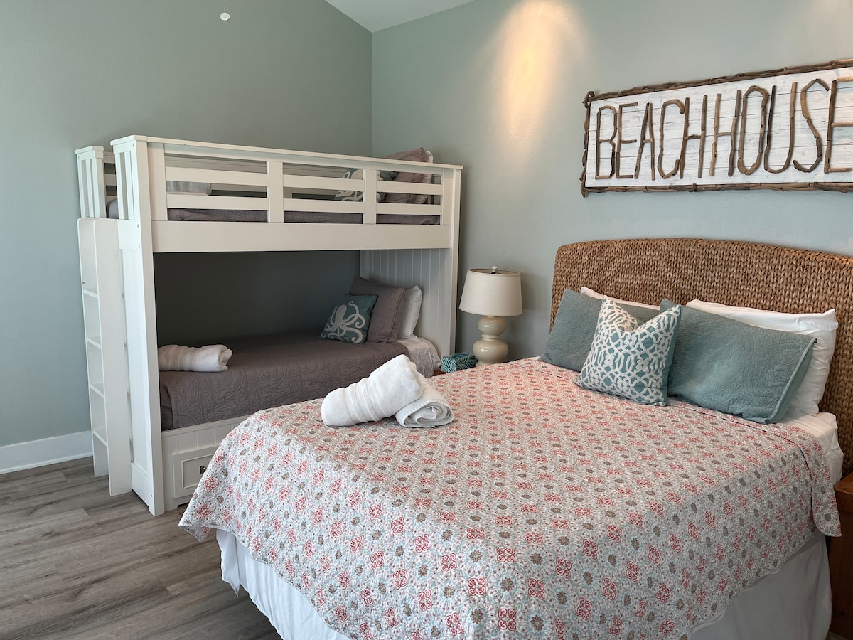 great views of the bay and side yard with pottery barn bunk beds.  Also has a private full bath attached.