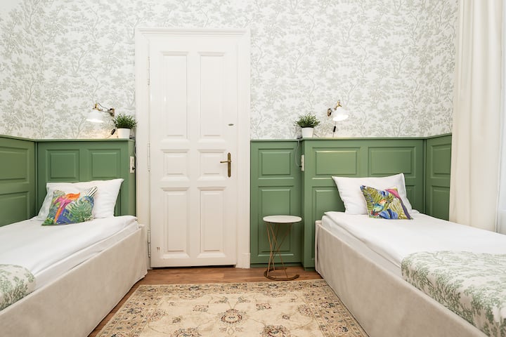 bedroom with two large single beds