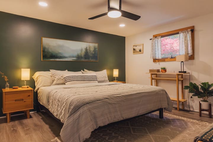 Master bedroom with closet and mini crib
