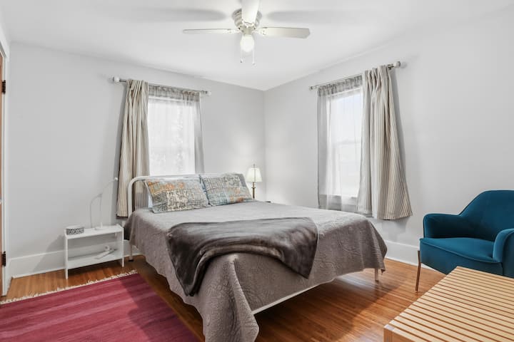 Queen size bed, closet w/shelving, blackout curtains.