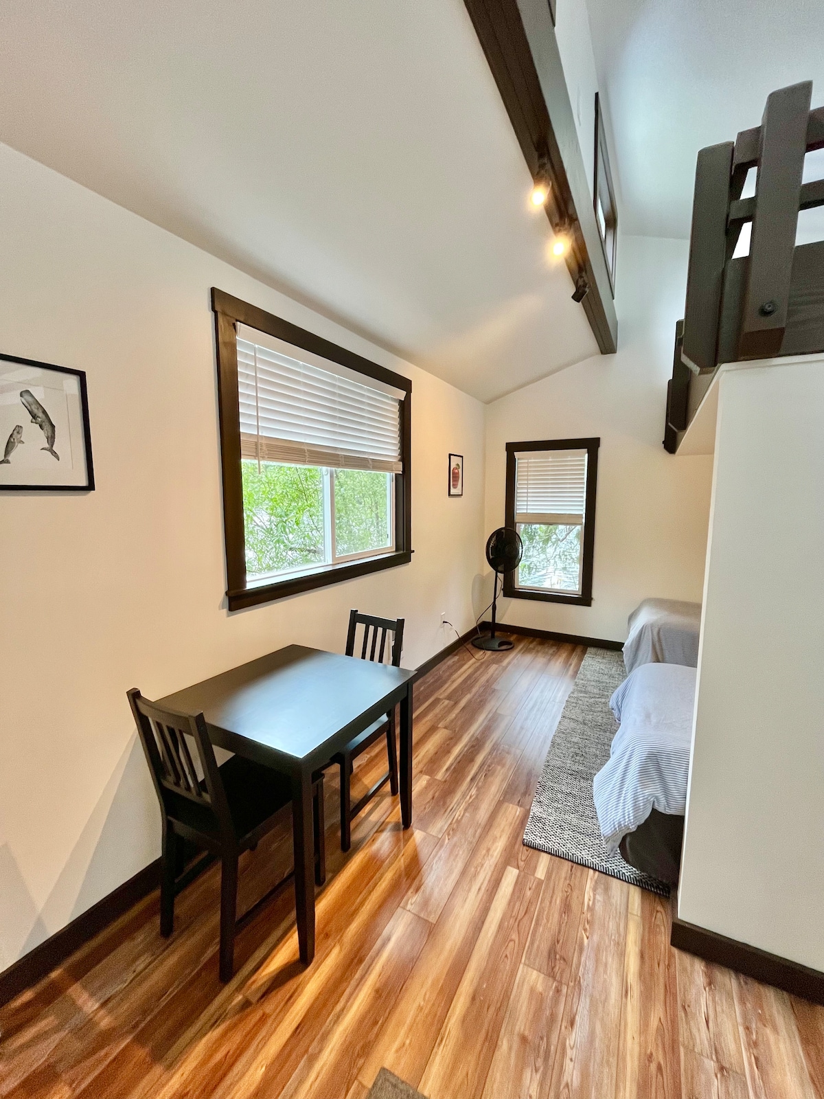 Cabin with three beds (2 twin, 1 double) approximately 75 feet from main house.

Separate, on island cabin with electricity, heat, but no plumbing.  