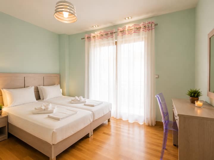 Main Level - Bedroom 6 with two single beds (can be joined into a king-size bed upon request)