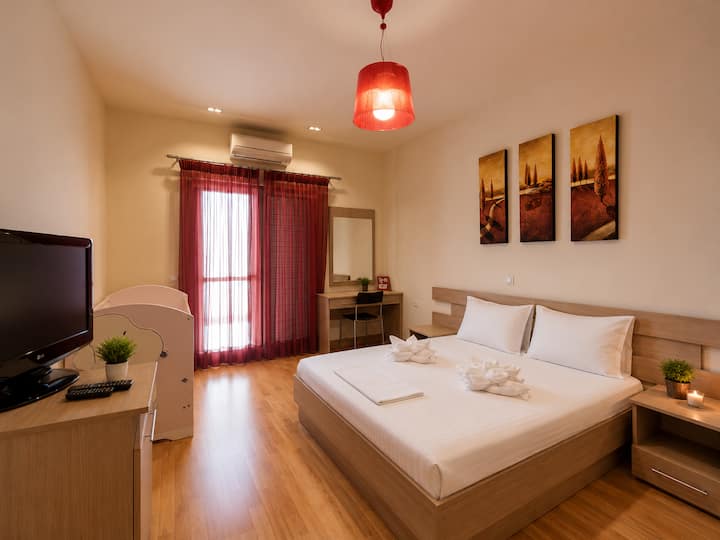 Lower Level - Bedroom 5 with a queen-size bed and a private ensuite bathroom