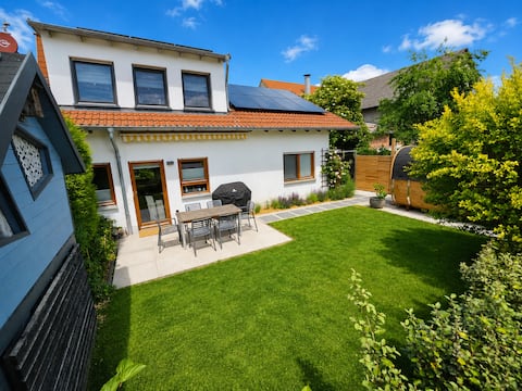 Modern holiday home with garden, grill & sauna