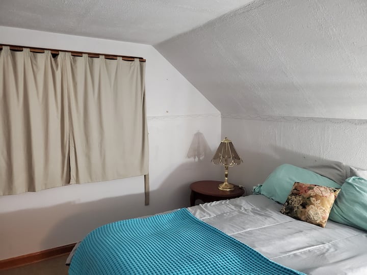 upper level bedroom. full size bed