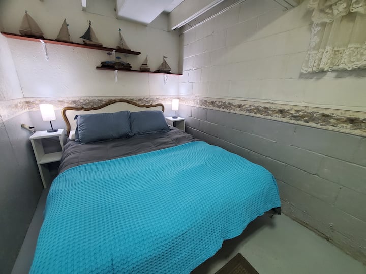 Basement bedroom. Small and cozy with a queen size bed