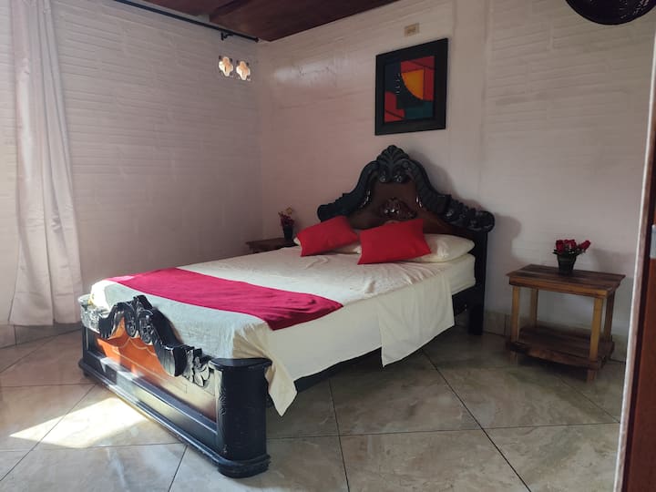 Queen bedroom with en-suite bathroom and fresh linens