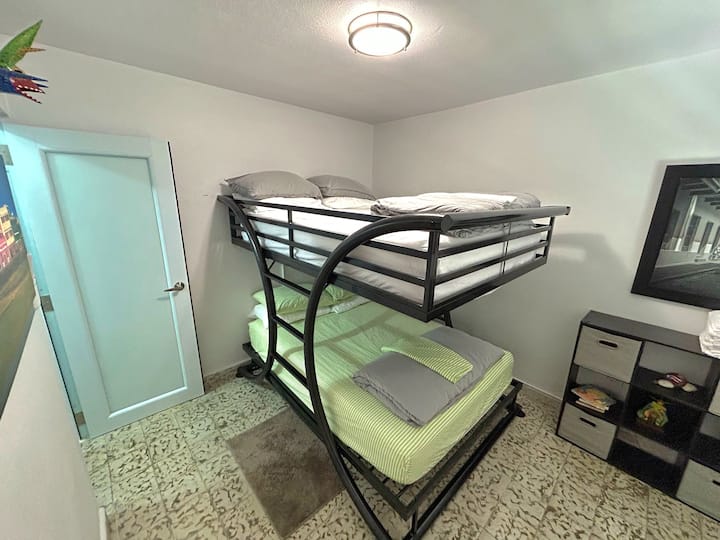 Second bedroom has a Full-Full size bunk beds with A/C. The top bunk bed may hold upto 400 pounds.