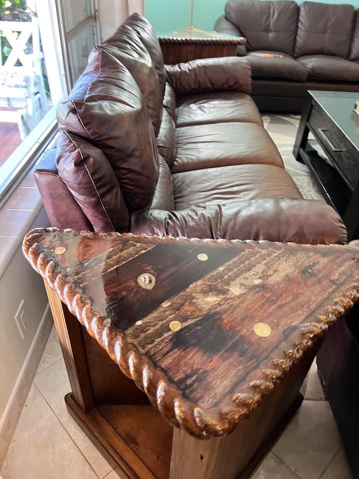 Room enough for everyone. Tempurpedic queen sofabed in a trio of leather couches. 50-in Roku HD smart TV. 

Classic 70s pirate Booty tables, straight from Tony, the owner of Deerfield Beach’s famous Durty Harry’s in Deerfield Beach.