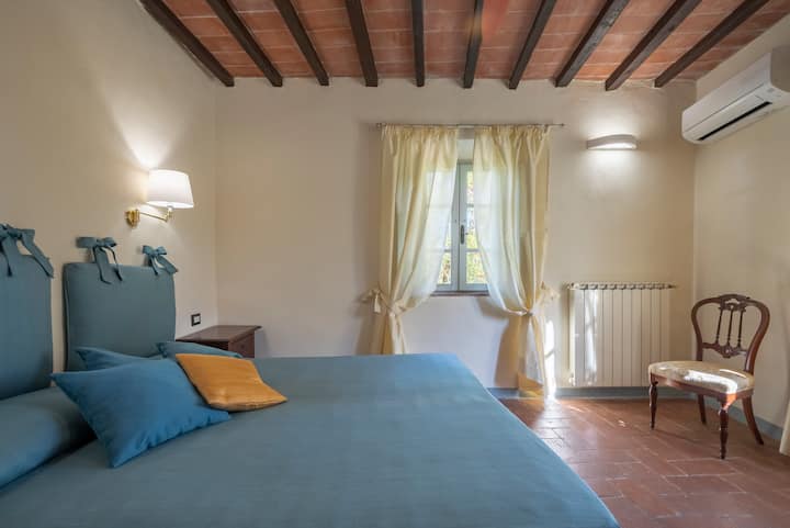 Letto matrimoniale con aria condizionata