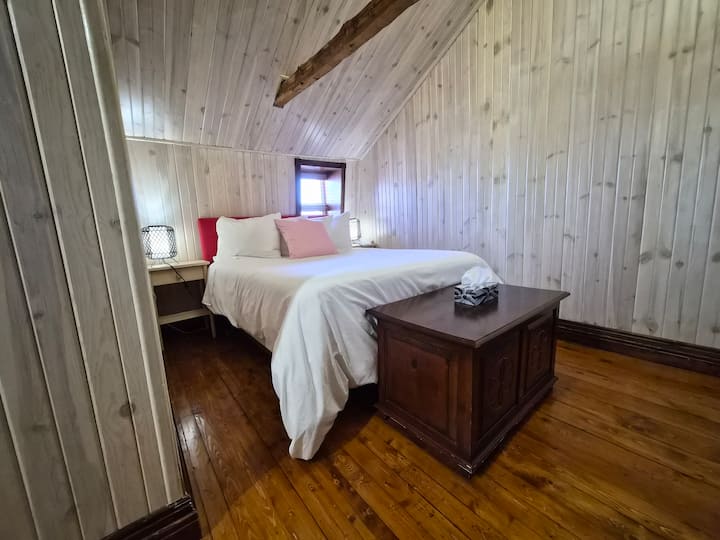 Bedroom 3 on the second floor with a soft double bed 