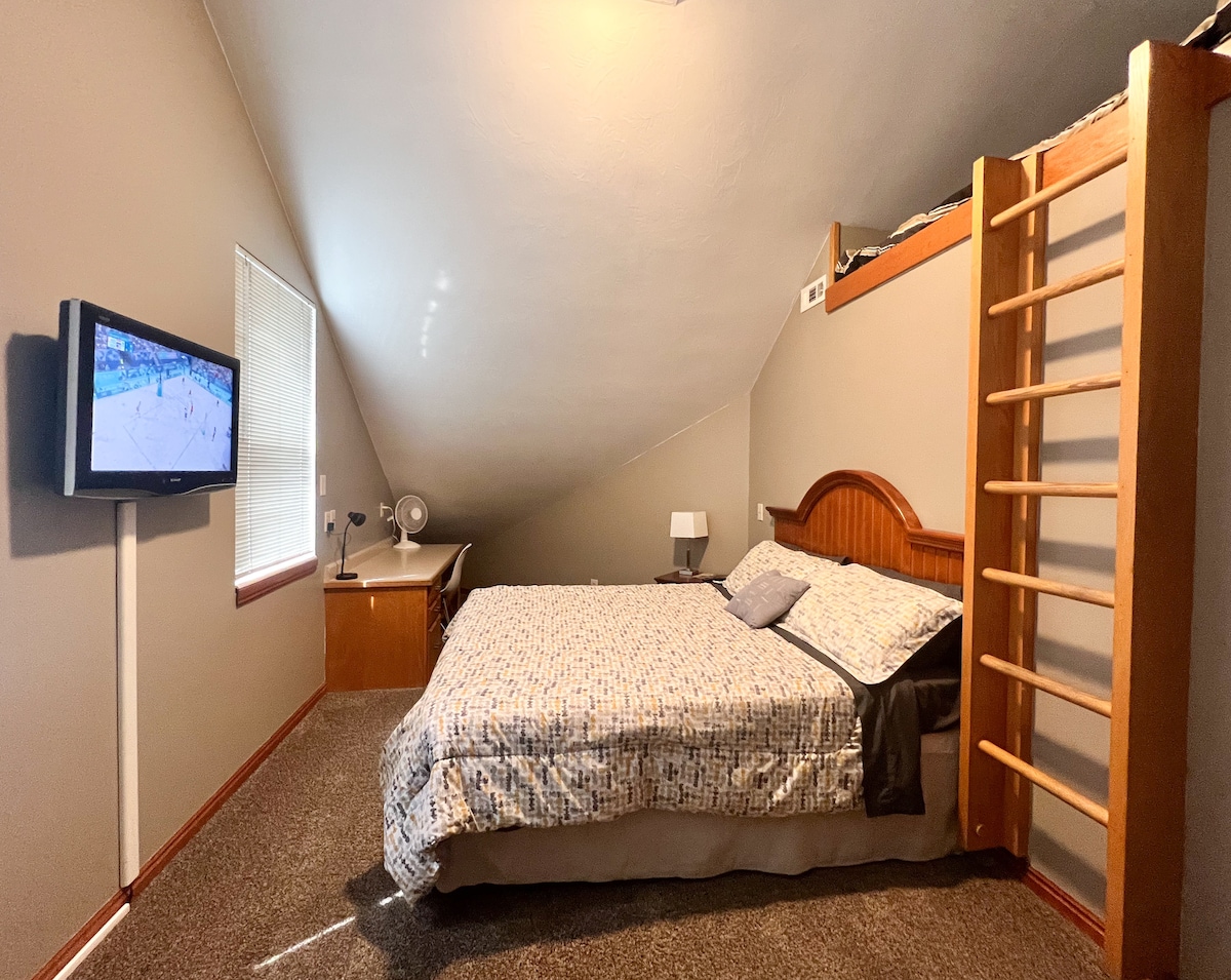 Bedroom 1/3 is your Master bedroom with a king sized bed and small padded loft area for extra sleeping space for children. The entrance and closet are to the right. 