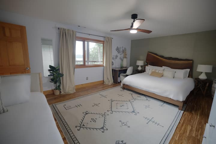 Master Bedroom - 'Walnut' has a king bed, twin bed, single floor mattress, ensuite bathroom and lake views.