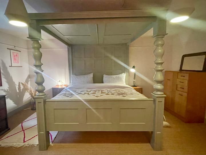 The most comfy four poster, super king bed - you’ll need a really good reason to get up! The upstairs space is a former art gallery, a huge room with the sitting area and log burner at one end and the gorgeous bed room at the other.