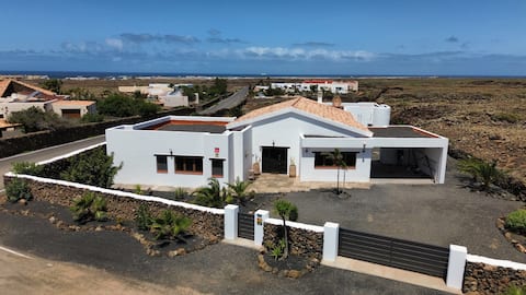 Villa with private indoor pool, garden & sea views