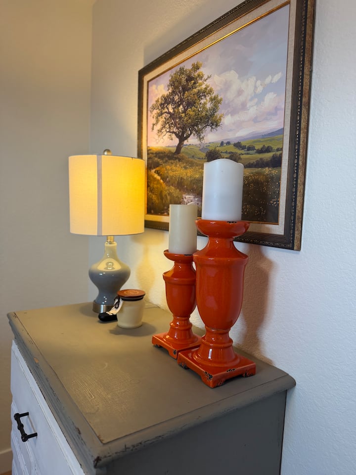 Rustic-inspired décor and cozy lighting add warmth and character, making this room feel like home.
